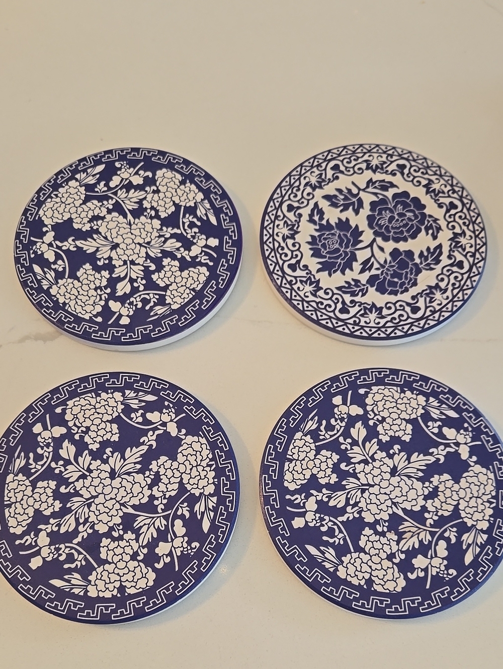 Blue and White Floral Ceramic Coaster Set - Elegant Table Accents